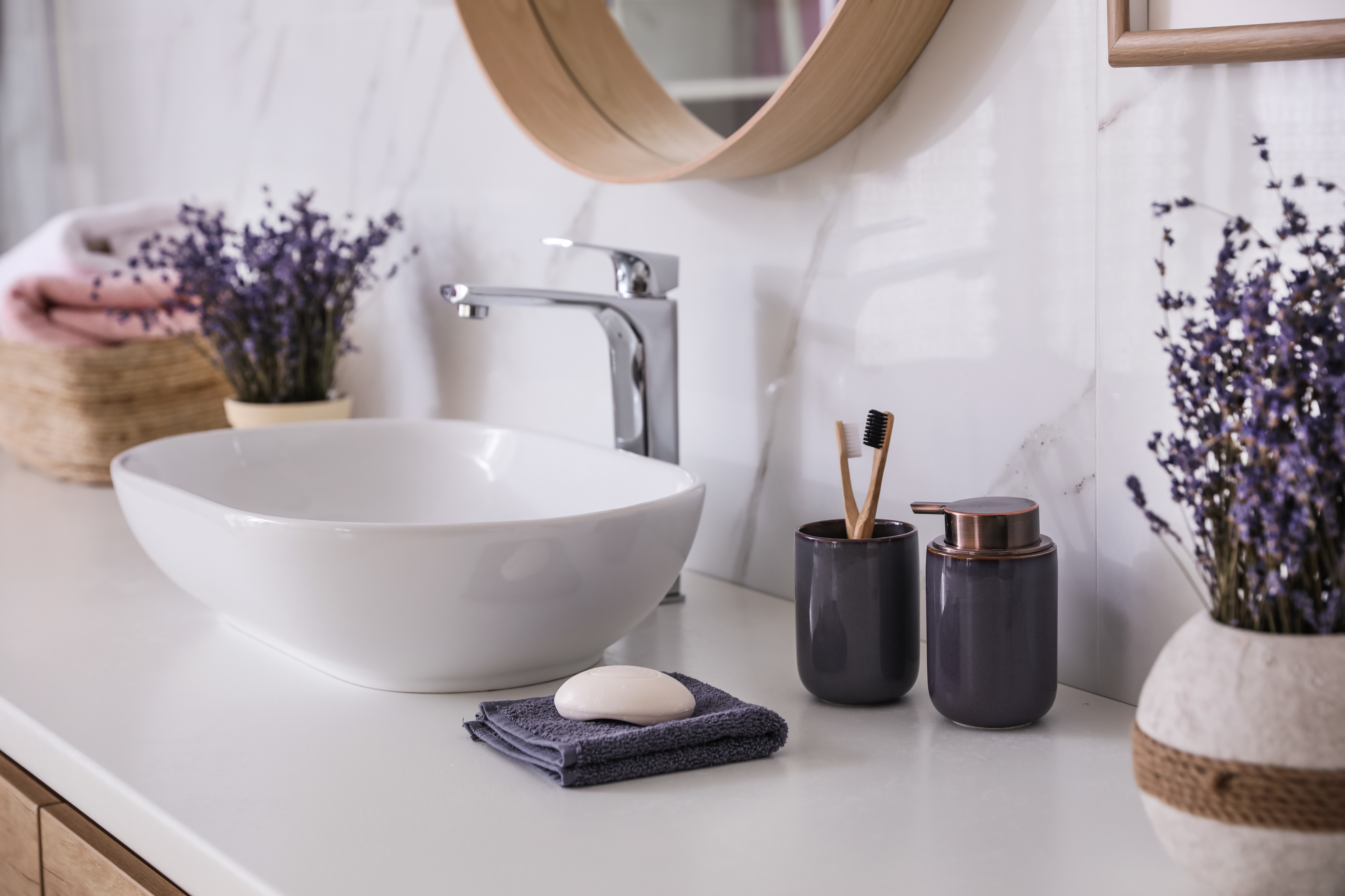 Bathroom Counter with Vessel Sink, Accessories and Flowers. Inte